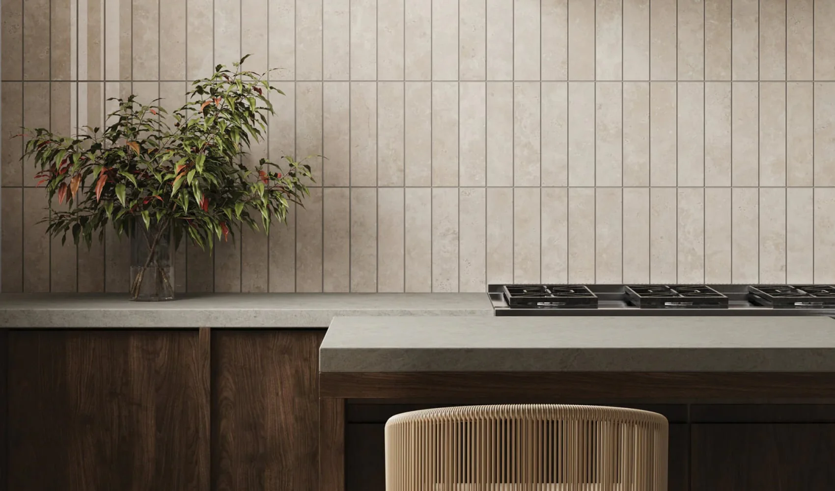 Vertical 3x6 subway tile and white quartz kitchen countertop.