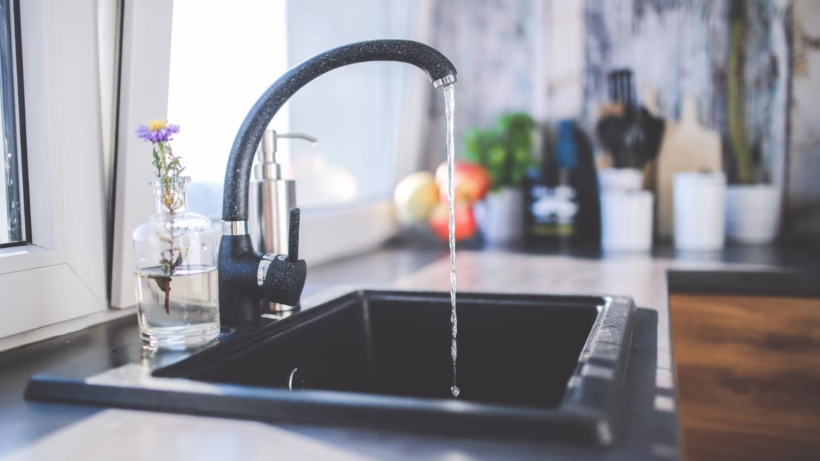 Black Kitchen Sink Closeup in a modern remodel.